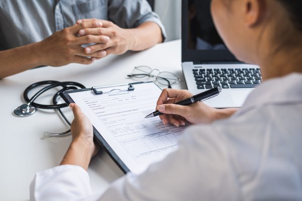 Professional medical doctor consulting her patient at hospital, Healthcare concept Professional medical doctor consulting her patient at hospital, Healthcare concept